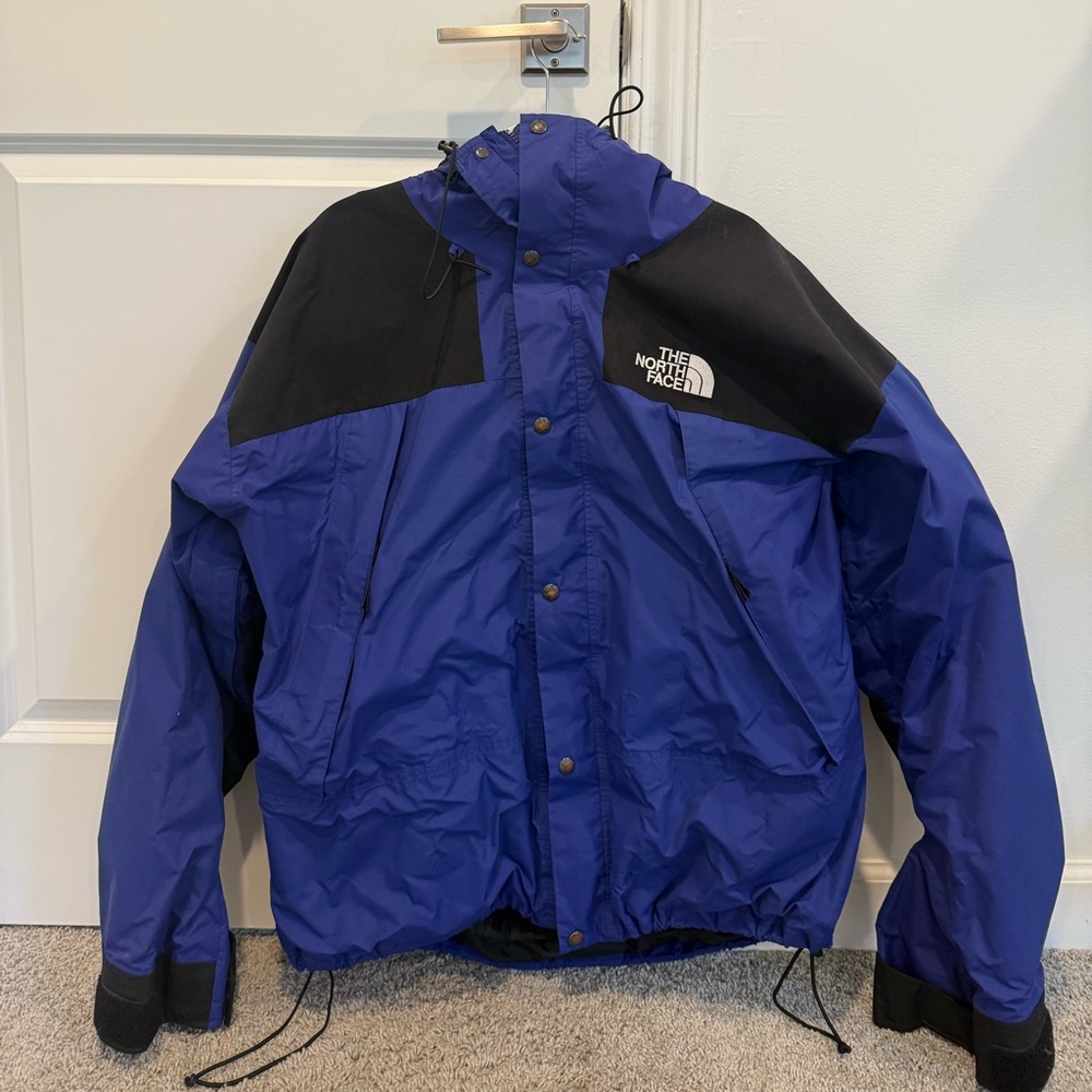 The North Face Men's Performance Jacket in Blue and Black